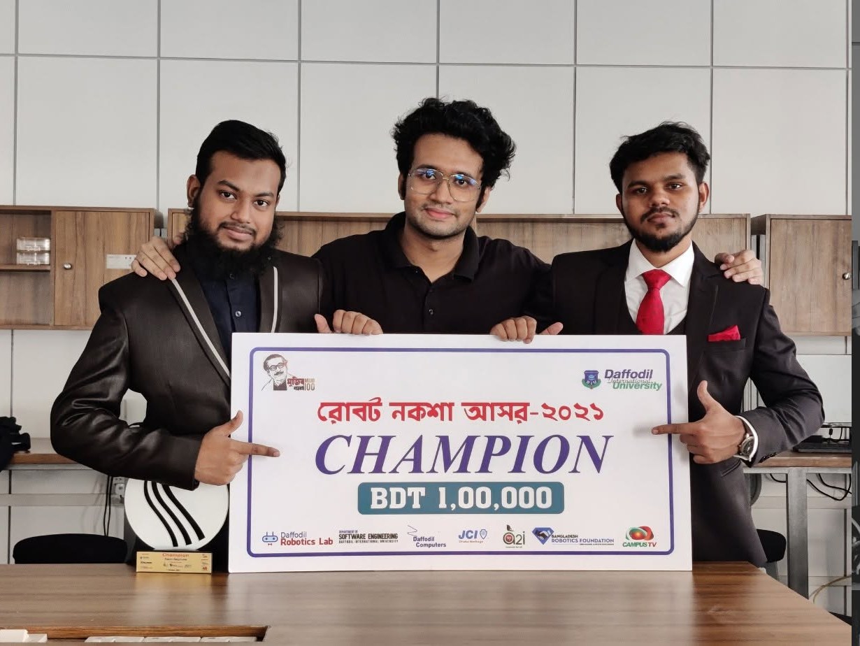 Three team members holding an oversized cheque reading Robot Noksha Asor 2021, Champion, BDT 1,00,000.